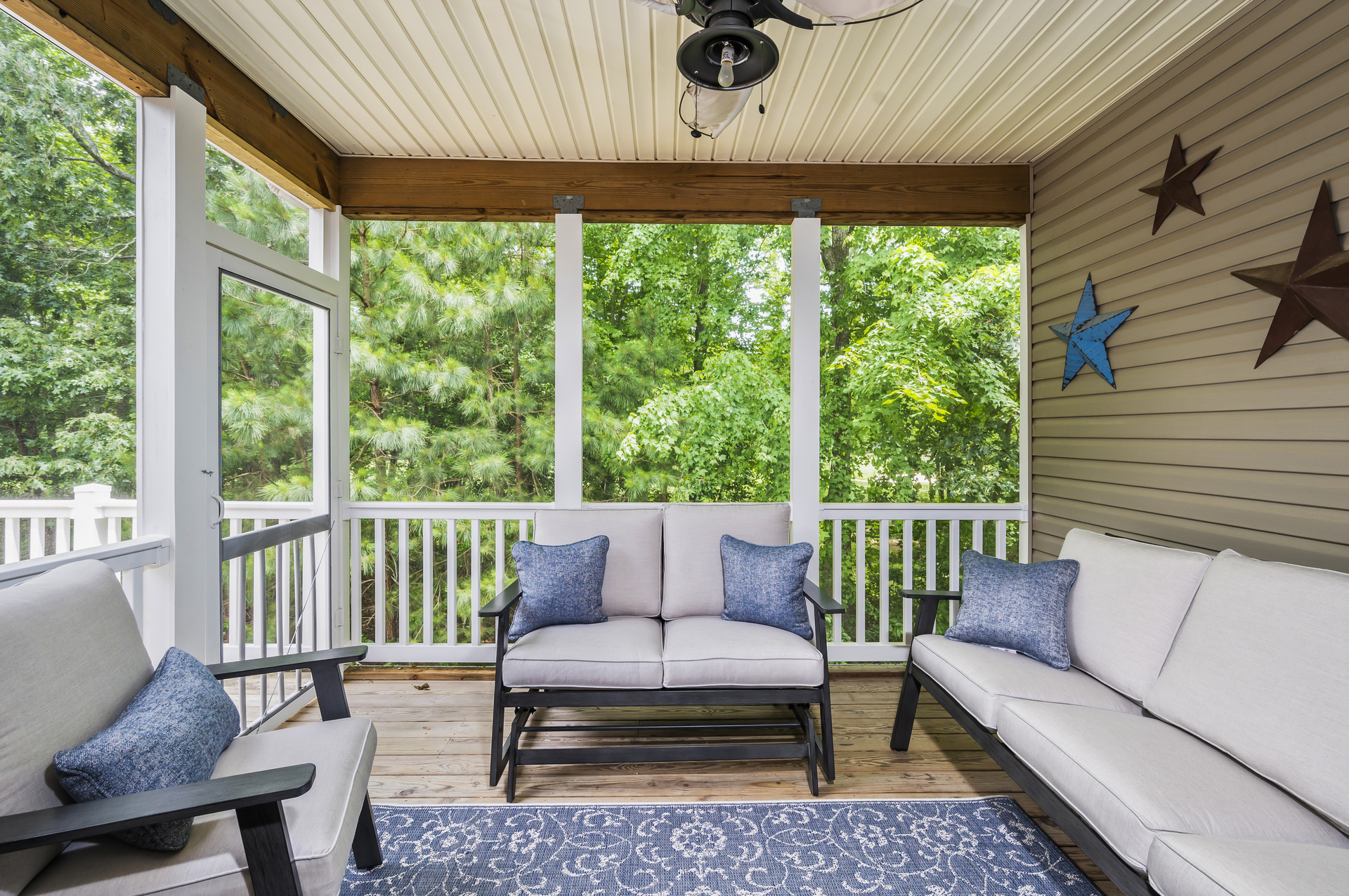 This screened in porch will make the golfer in your family swoon over the views of the OP Golf Course