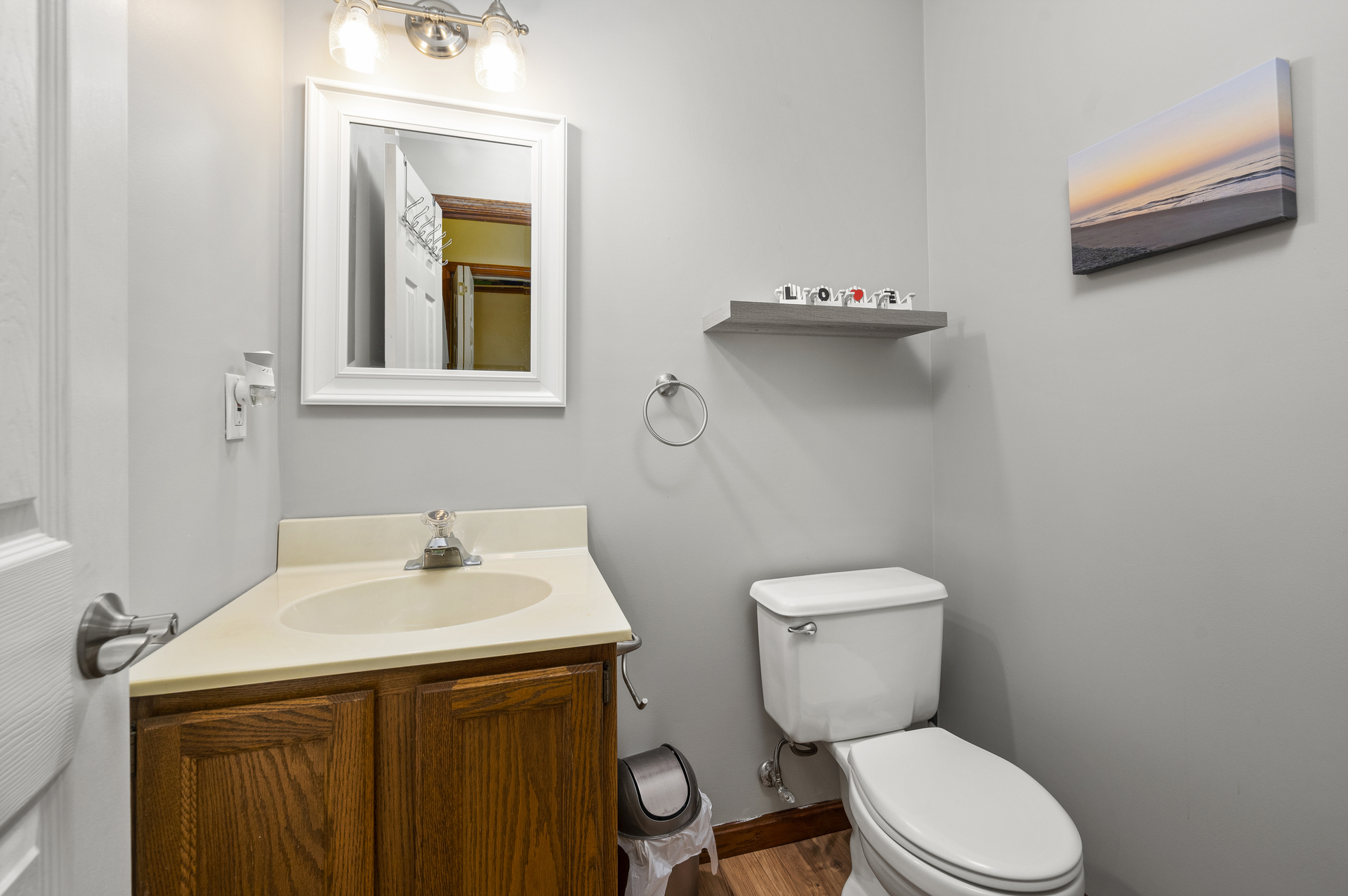 Half Bath is convenient to Kitchen and Living Area.