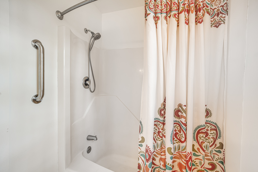 Full Bath 1 is convenient to Living Area and Bedrooms.