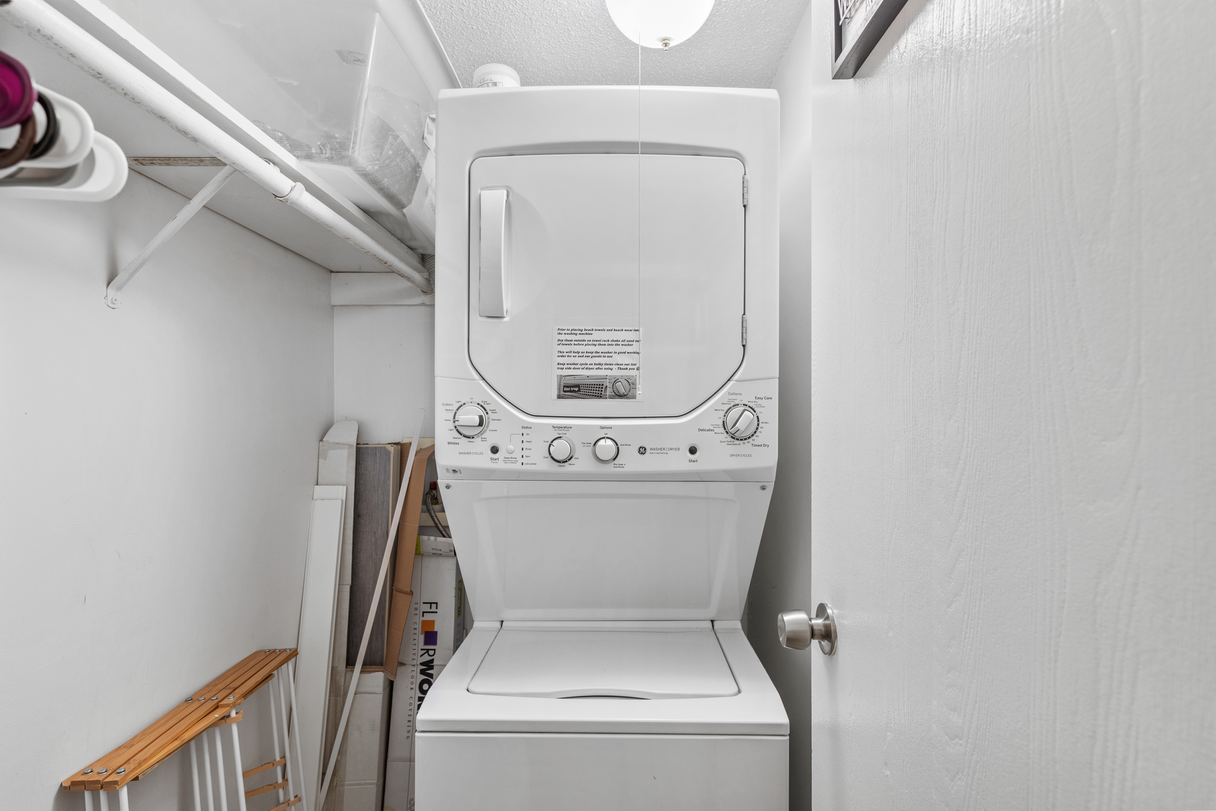 There’s even a convenient stacked Washer and Dryer located in this room just in case you need it.