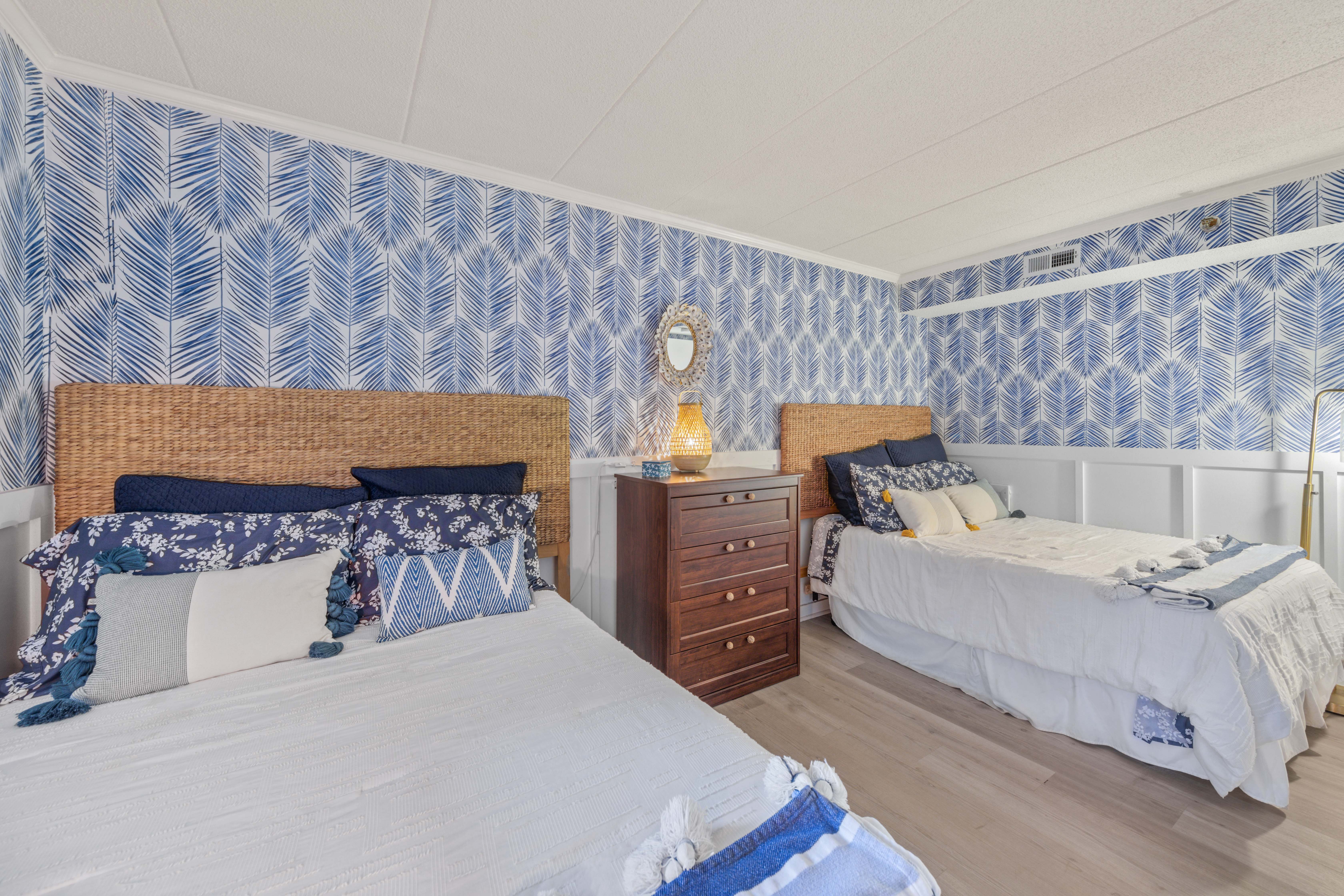 This Bedroom has 2 Plush Full Beds!