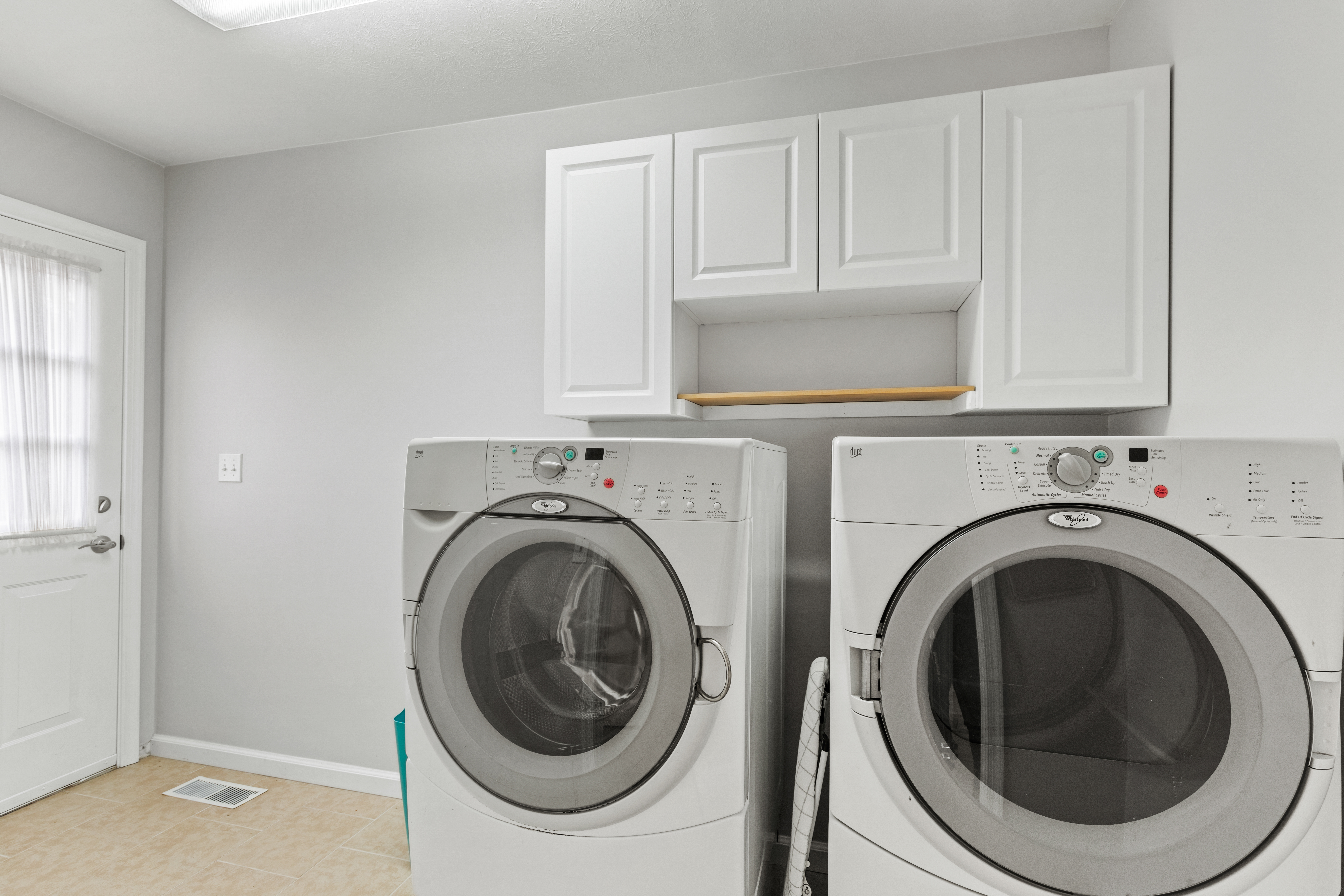 Laundry Room with Full Sized Washer & Dryer for your use.