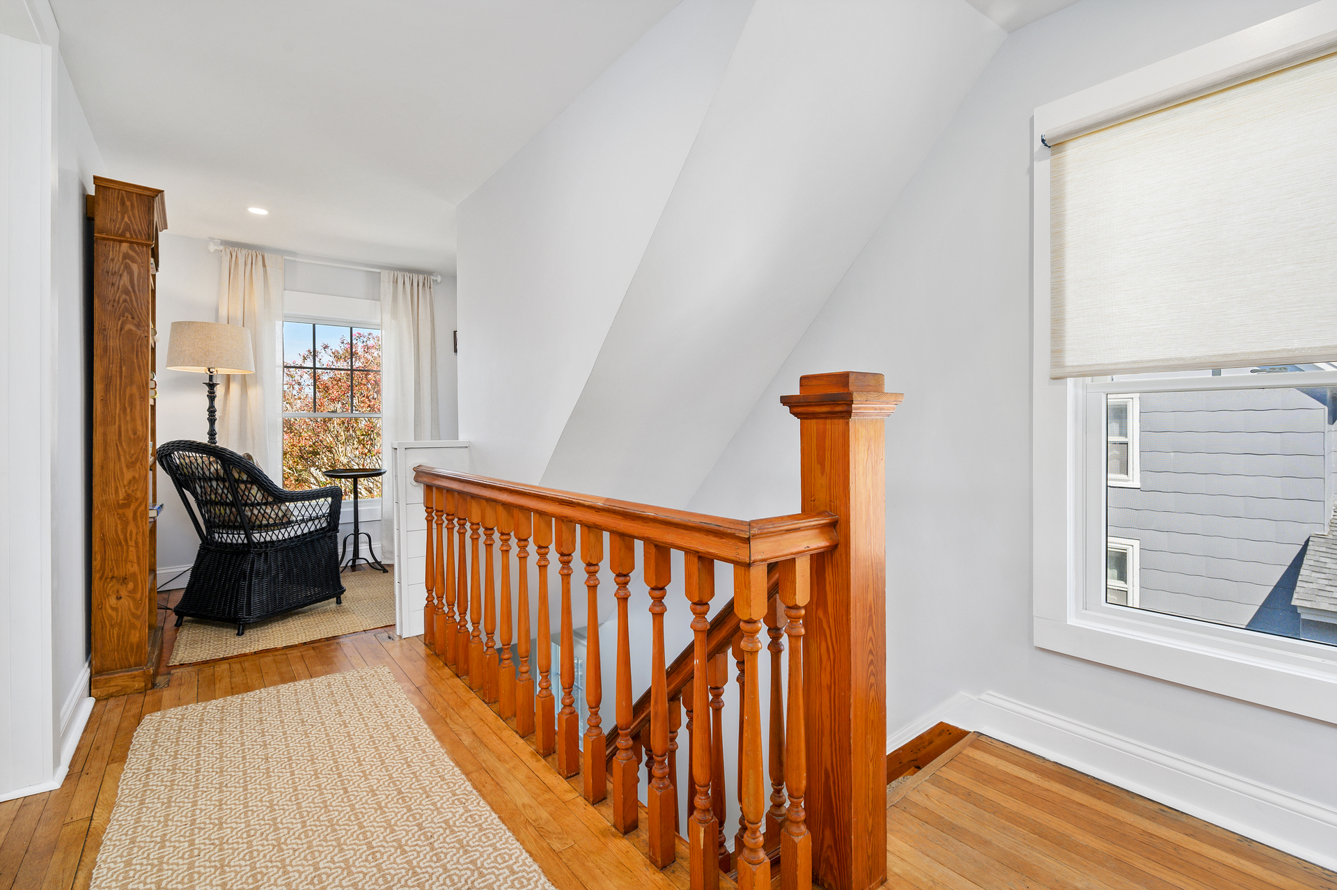 Wander upstairs to find 2 more Bedrooms, Full Bath 2, and a Sitting Area.