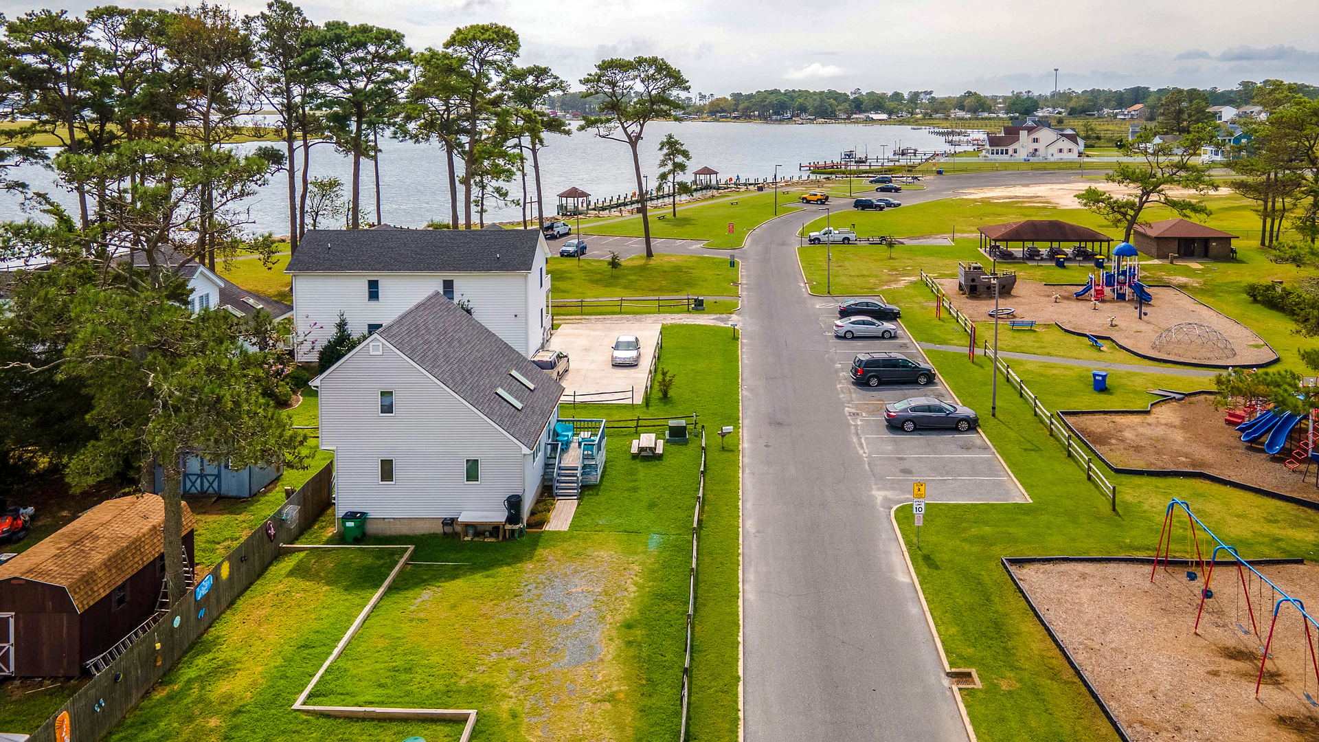 Just steps away is a Boat/Kayak Launch, Playground, and Pier.
