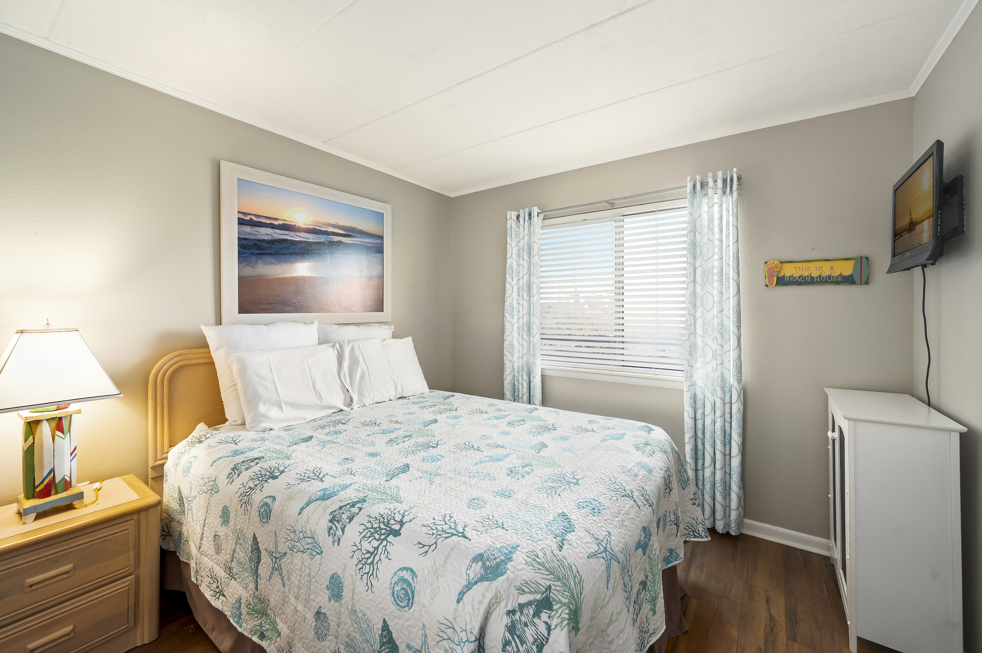 Bedroom 2 is Tastefully Decorated in Beachy Blues.