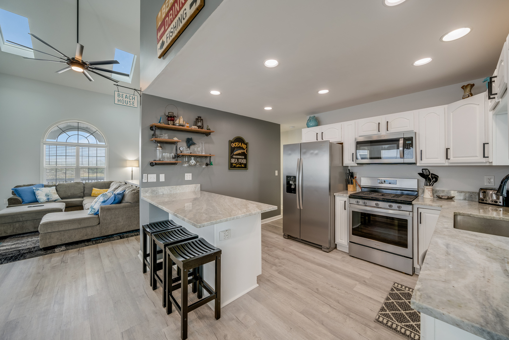 The Chef in your family will adore the Gourmet Kitchen with Stainless Appliances.
