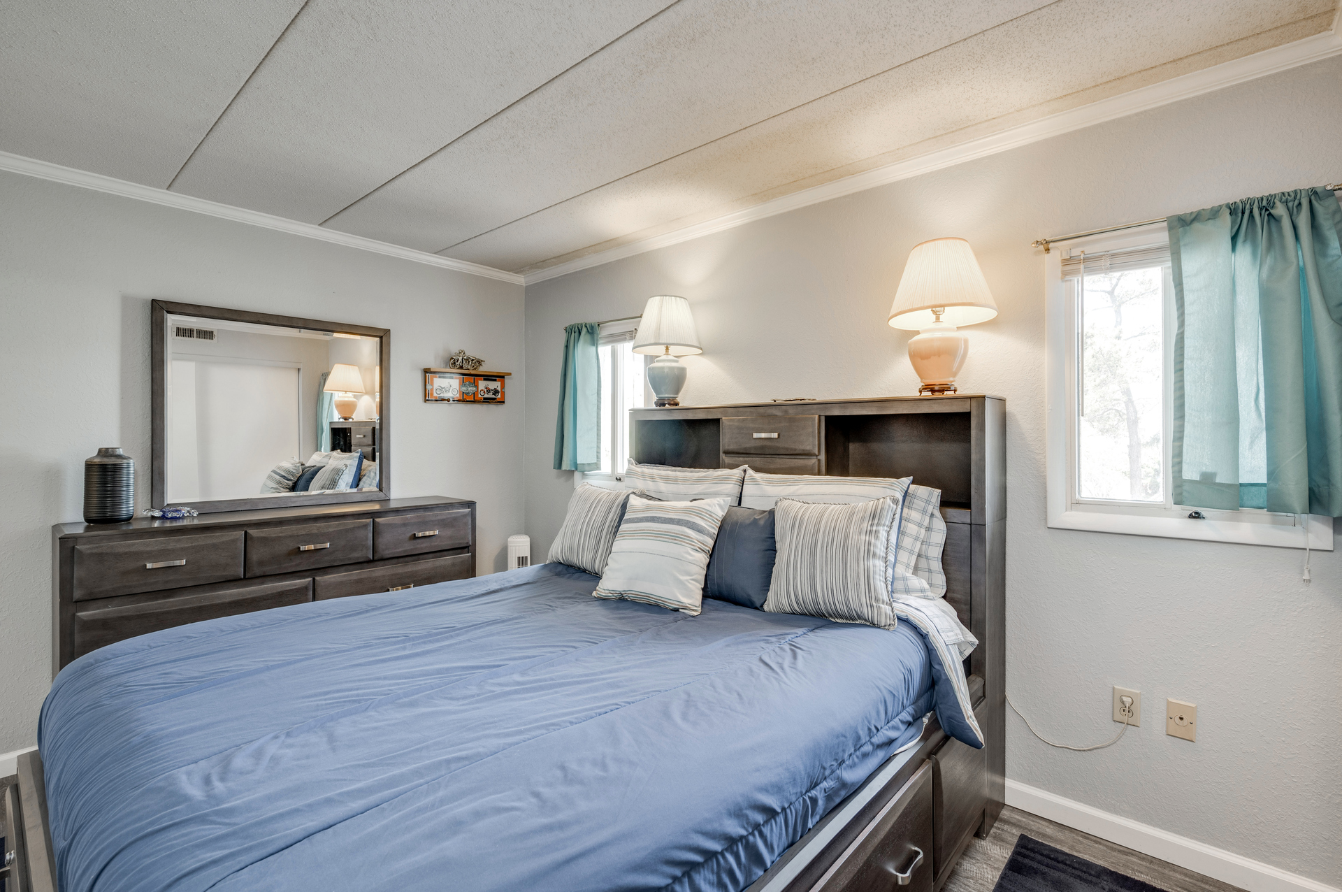 Primary bedroom with a cozy Queen bed