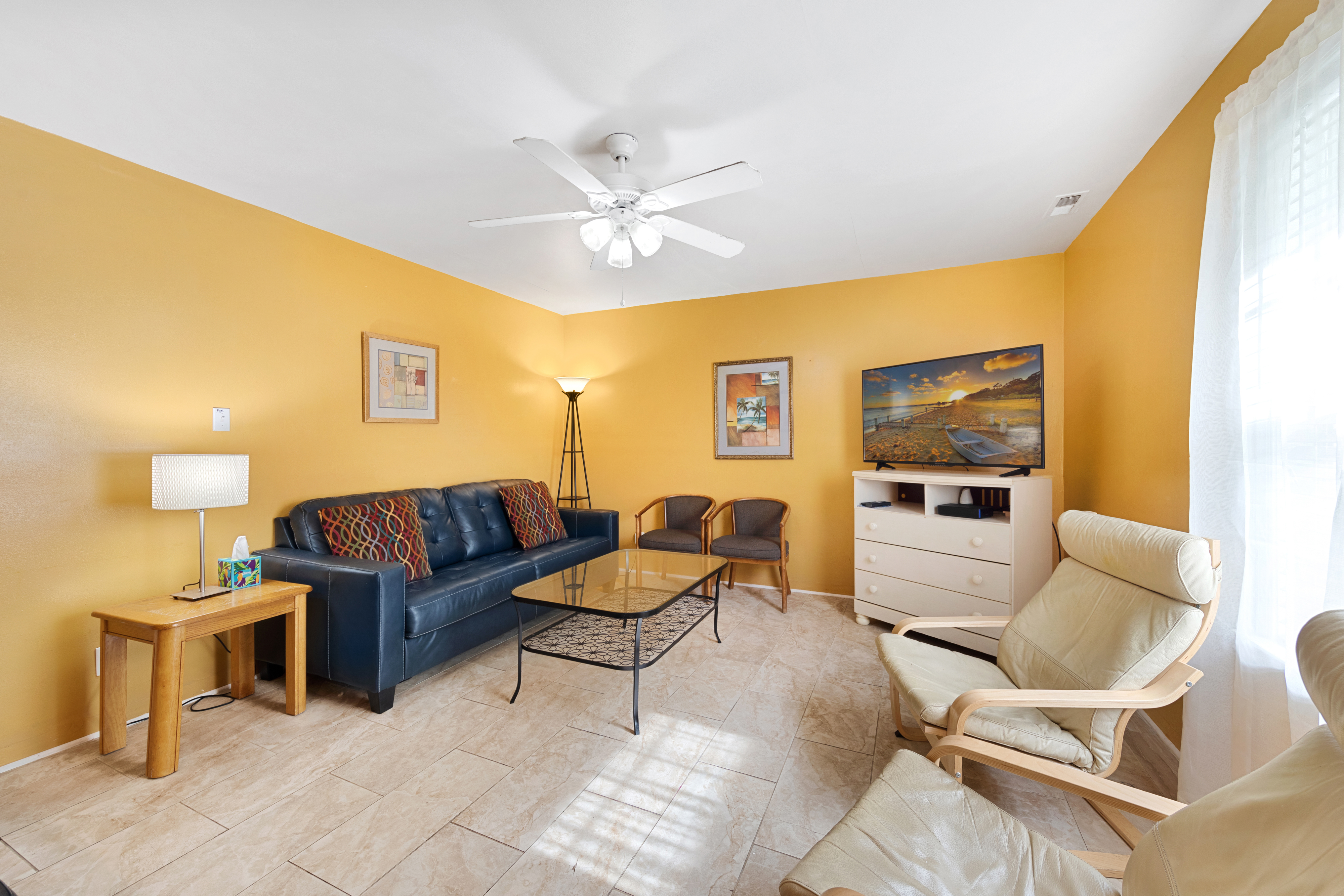 The bright and sunny living space is sure to brighten your day!