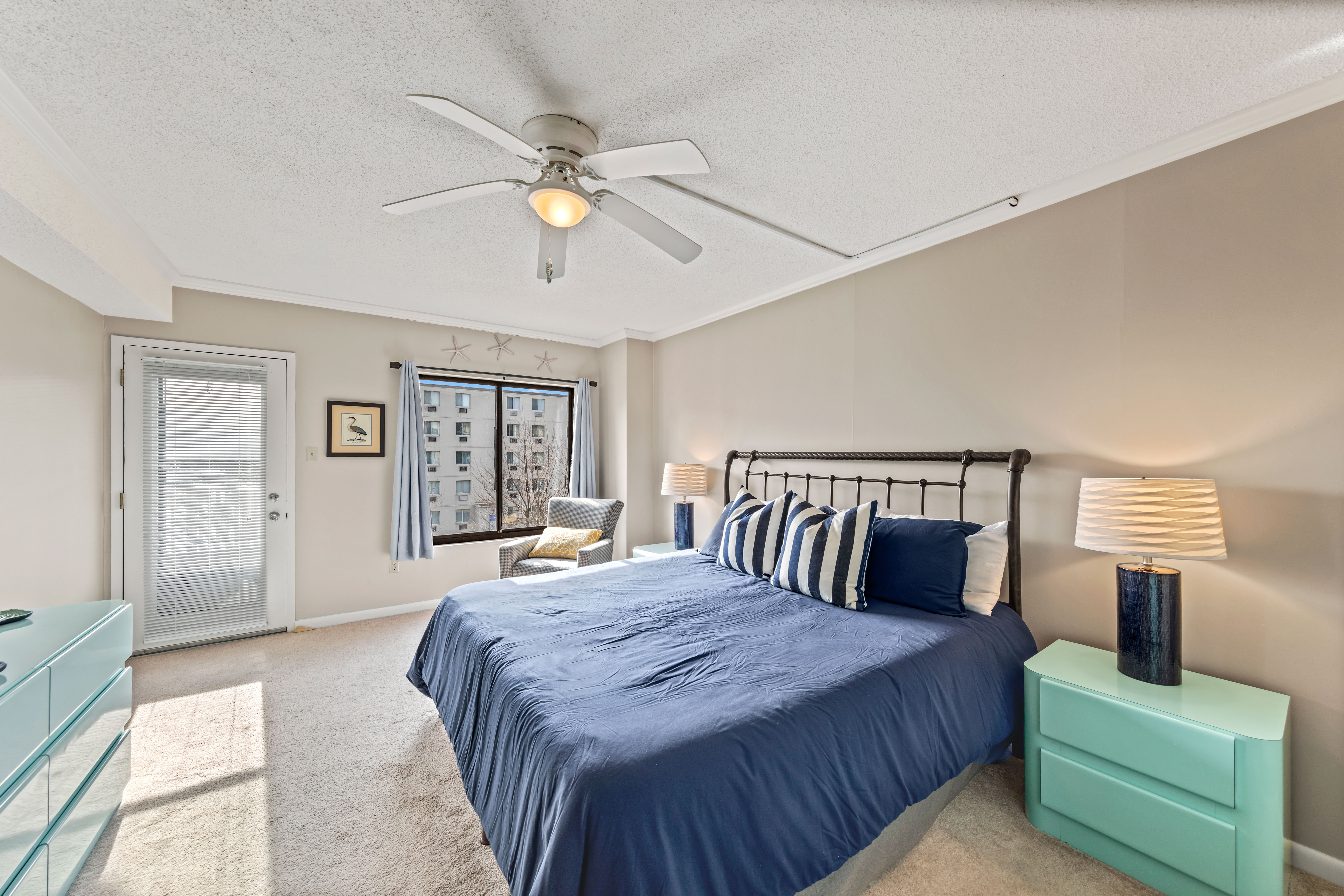 The Primary Bedroom features a Cozy King Bed.