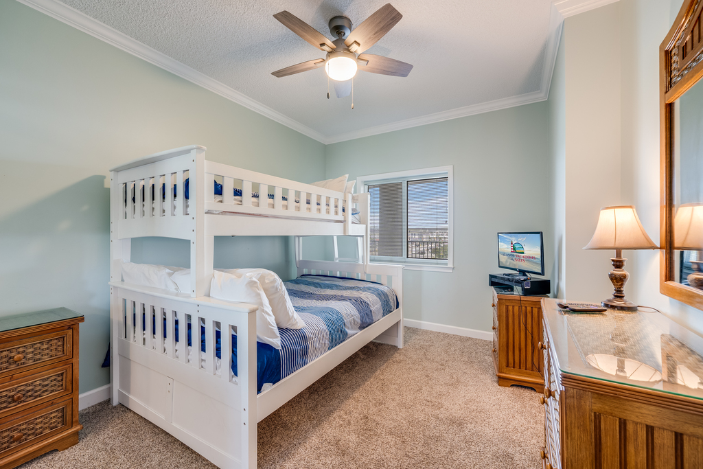 Bedroom 3 has a Pyramid Bunk Twin over Full and Beachy Blue Walls.