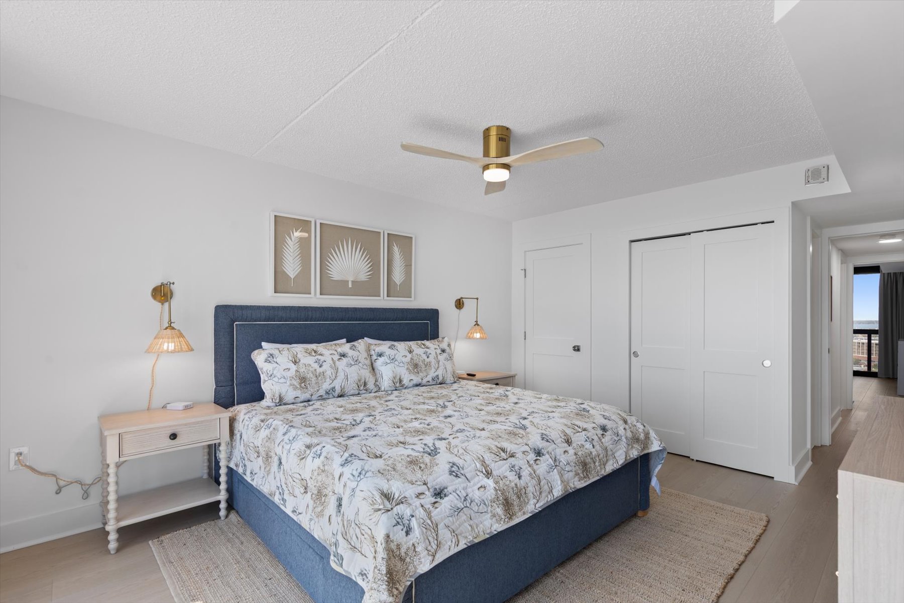 Primary bedroom features plush King bed.