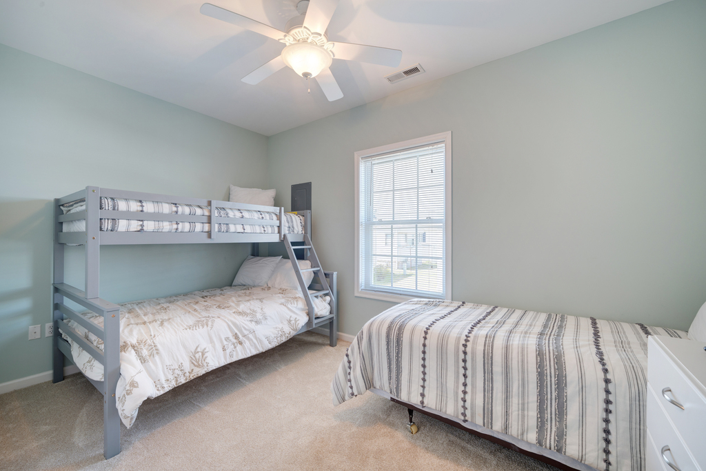 This Bedroom offers 1 Twin and 1 Pyramid Bunk Bed