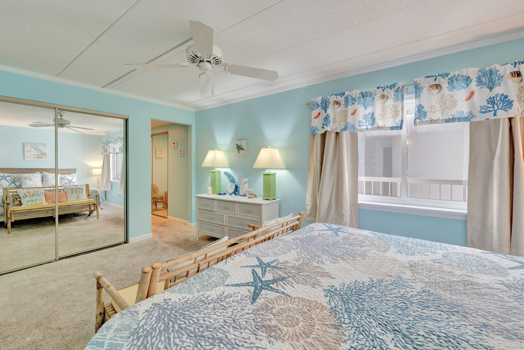 The spacious Primary Bedroom is tucked away from the main Living Area.