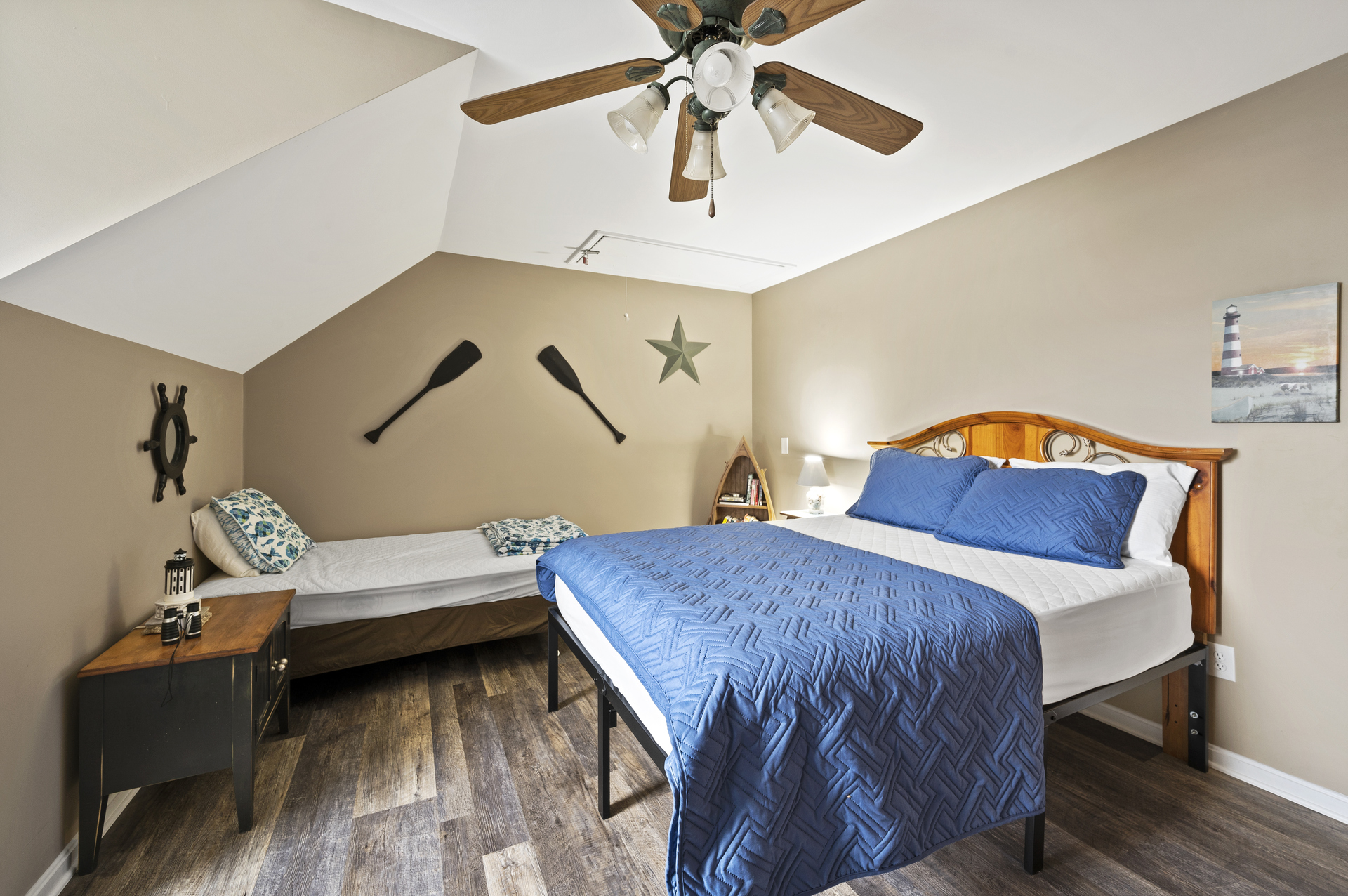 Bedroom 2 sleeps 4 with a Twin, a King, and a Twin Sleeper Chair.