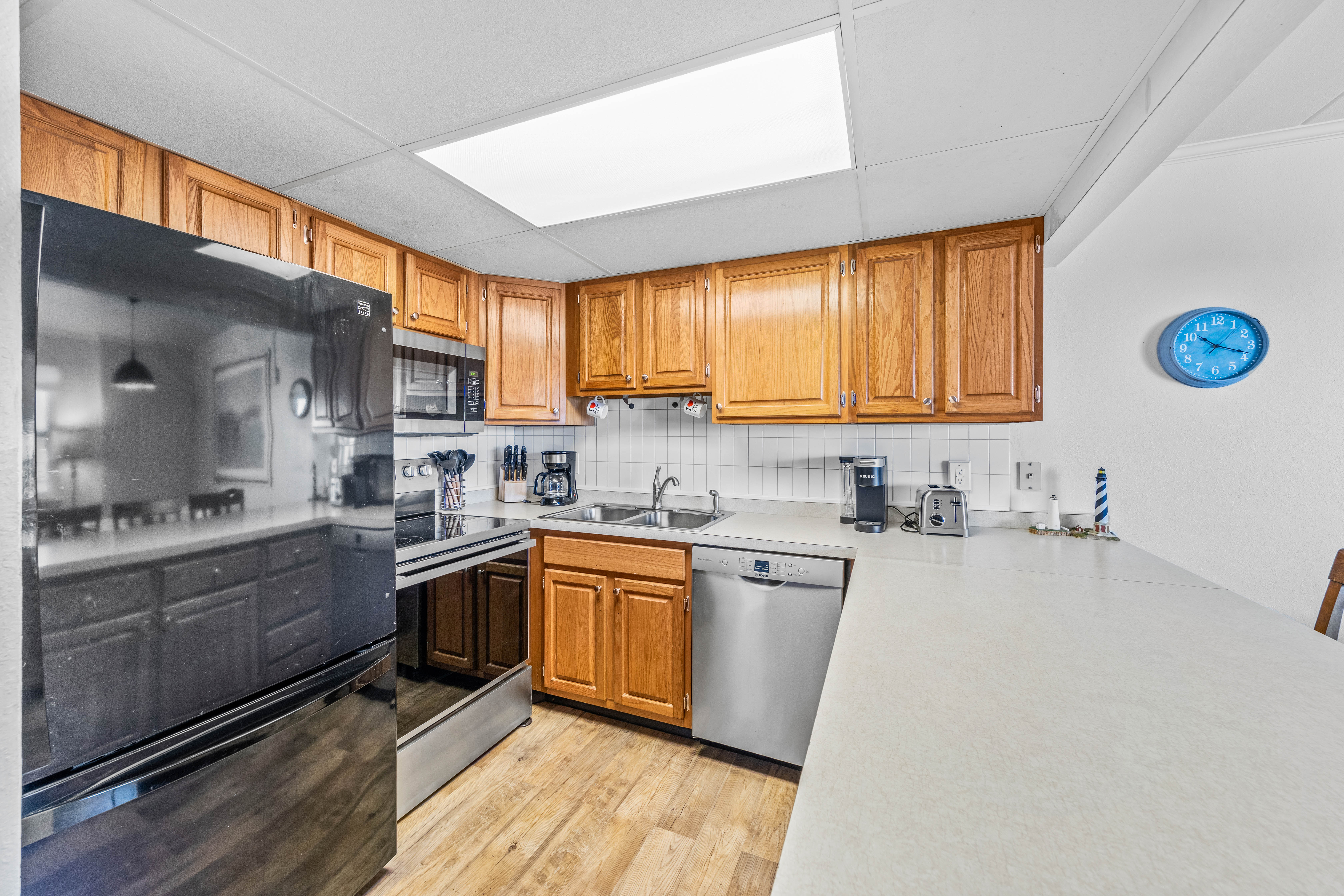 This kitchen has all the major appliances of home, for your convenience.
