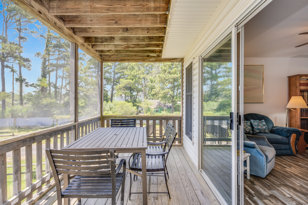 Dine Al-Fresco on the Screened Porch and listen to the Tree Frogs sing.