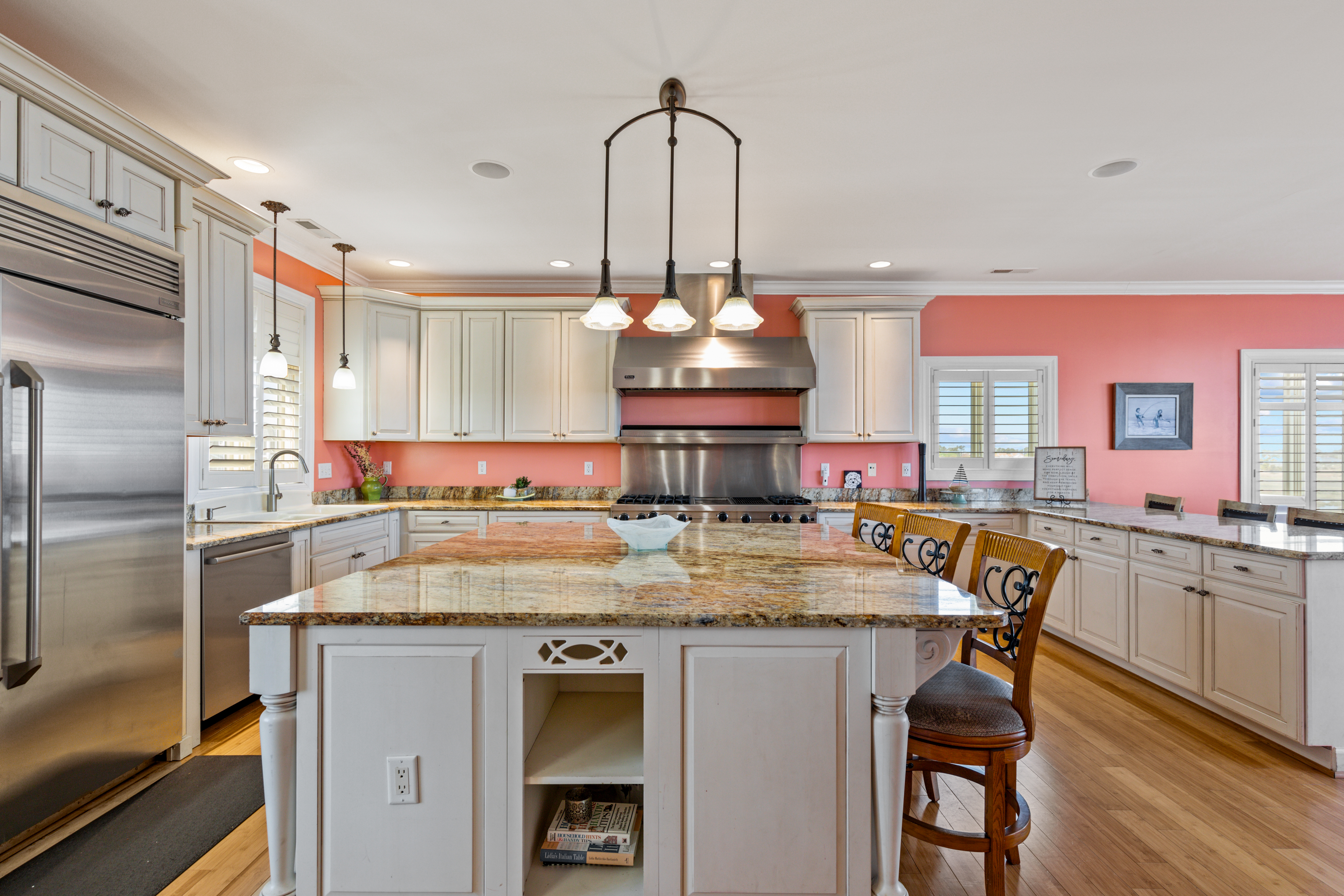 It has a Well-Stocked Kitchen with gleaming Quartz Countertops, Gourmet Appliances.