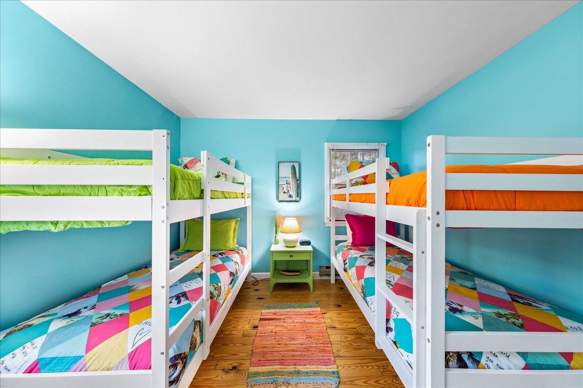 The kids will love this bright and beachy Bedroom.