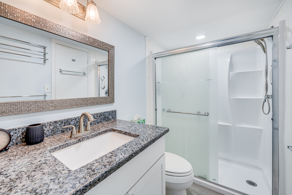 The Full Bath offers a Walk In Shower!