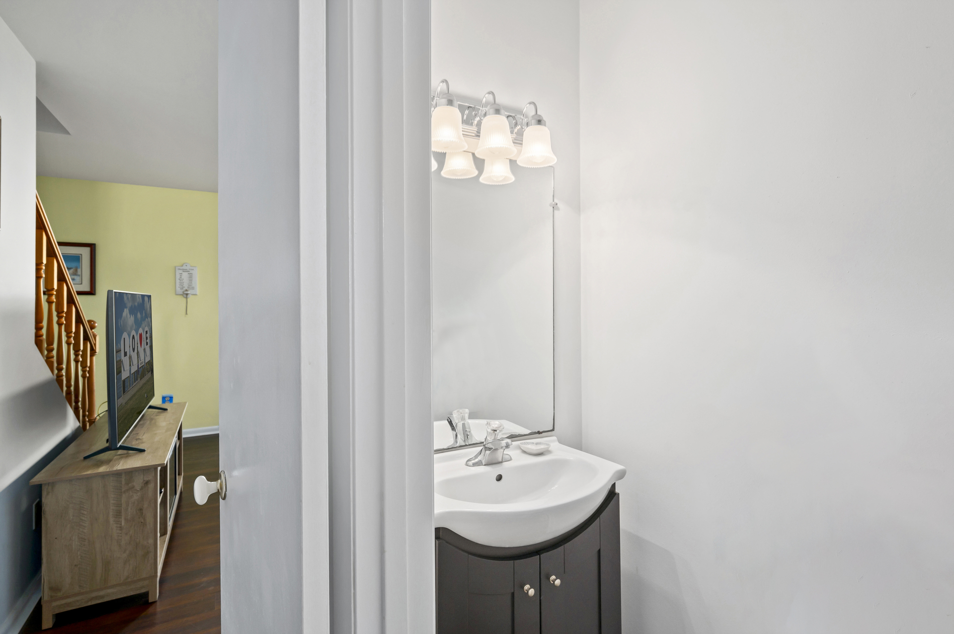 Convenient Half Bath just off Living Area.