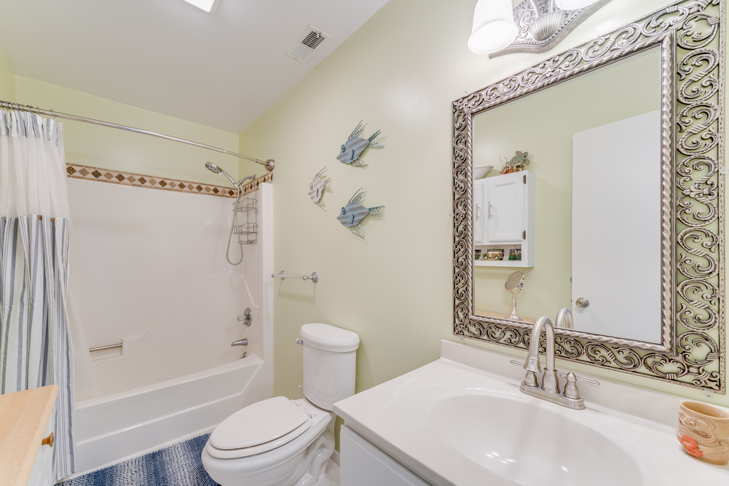 A Shared Full Bath upstairs has a Tub/Shower Combo.
