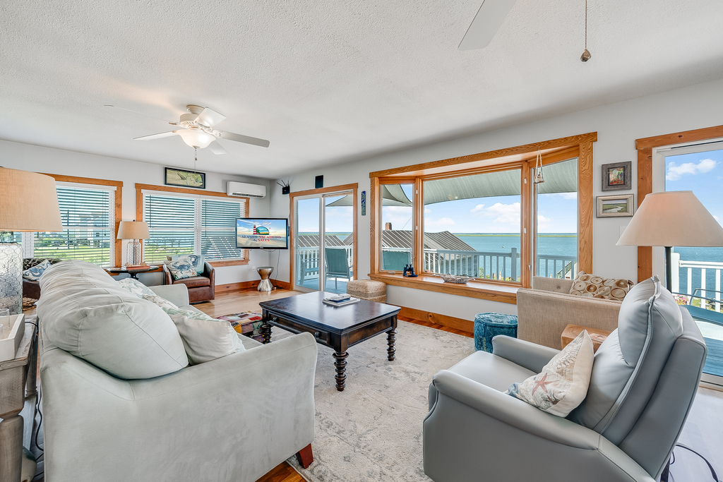 This stunning 3 Bedroom Home offers majestic Views of the Chincoteague Bay!