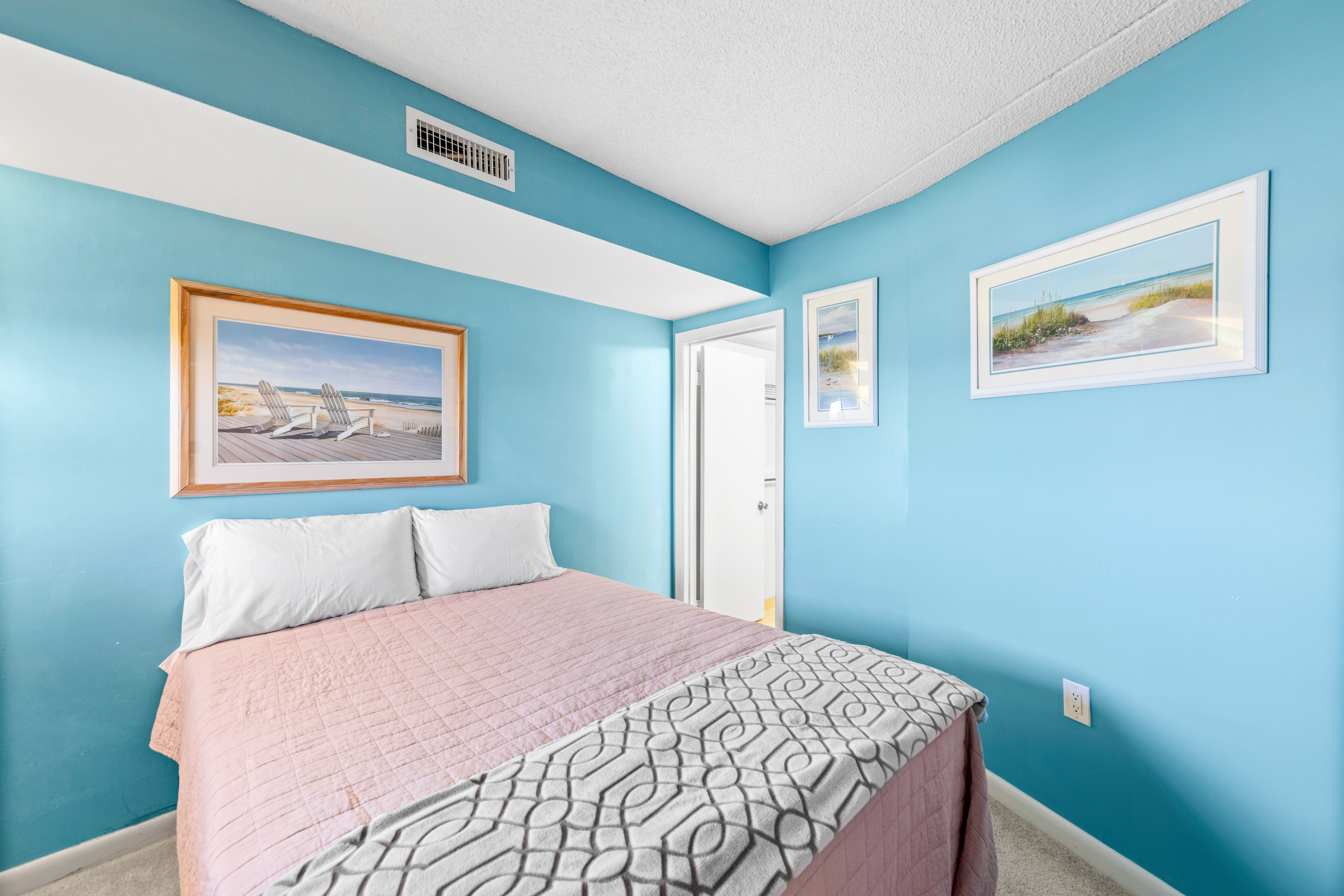 Bedroom 2 has a Plush Queen Bed.