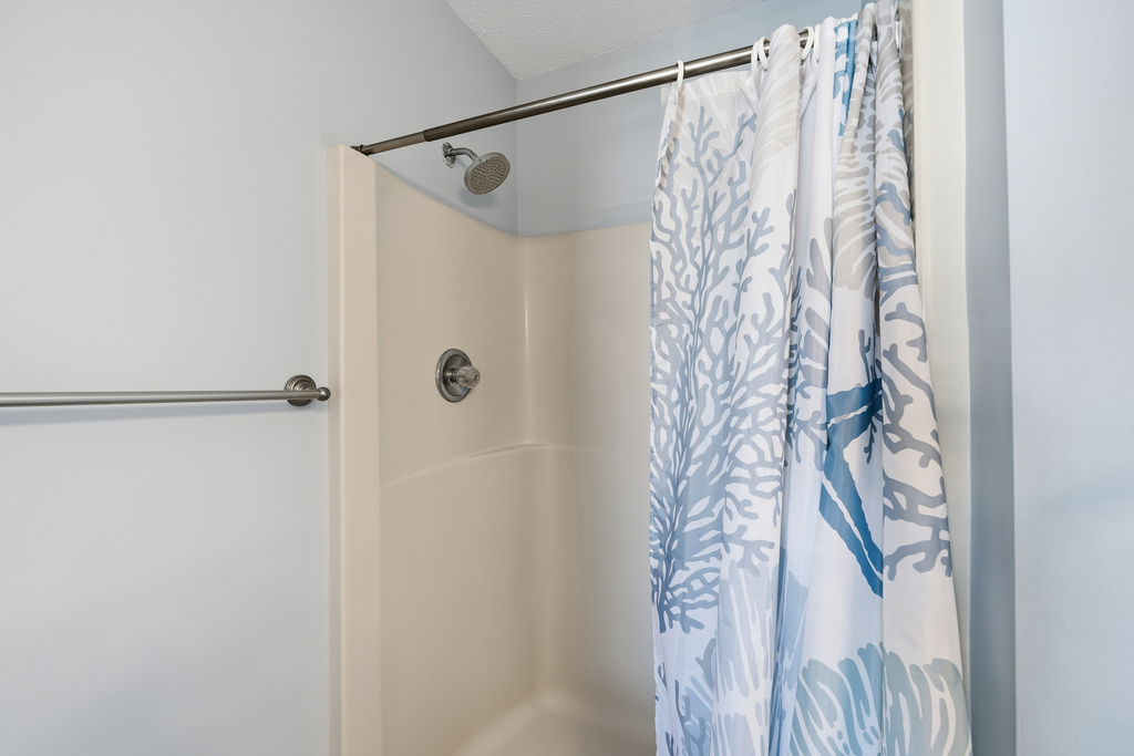 The Walk-In Shower is perfect to rinse off after a long day in the Sun!