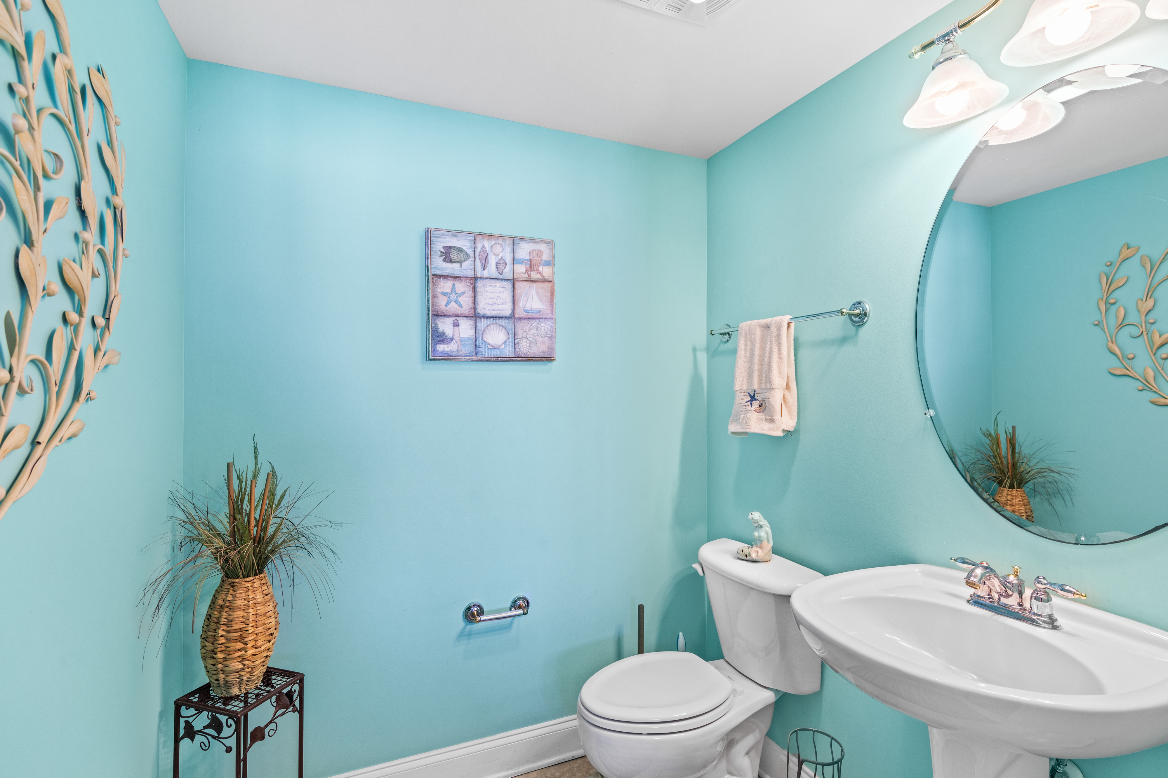 The convenient half bath located just off the living room.