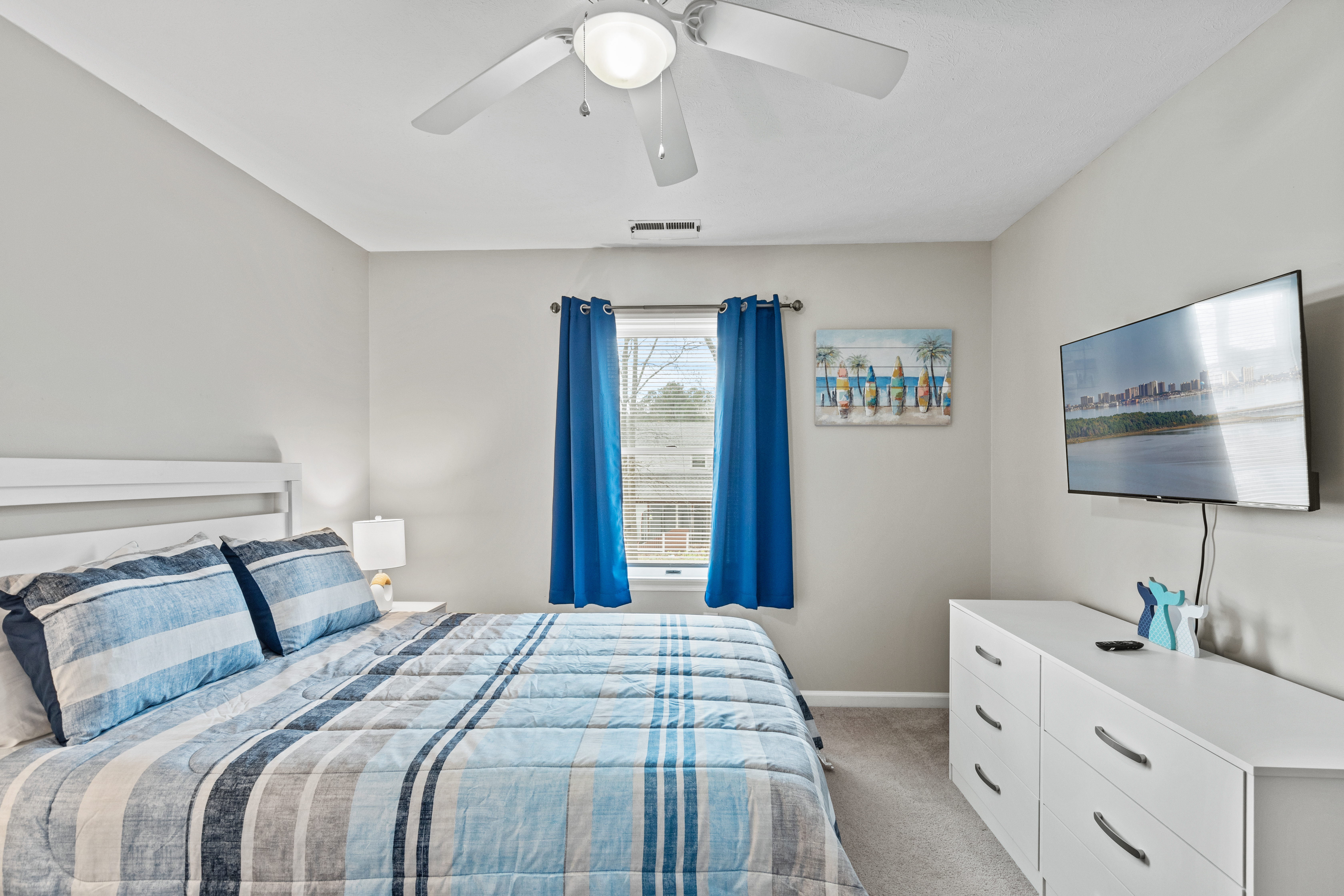 Tons of natural light is this tastefully decorated room.