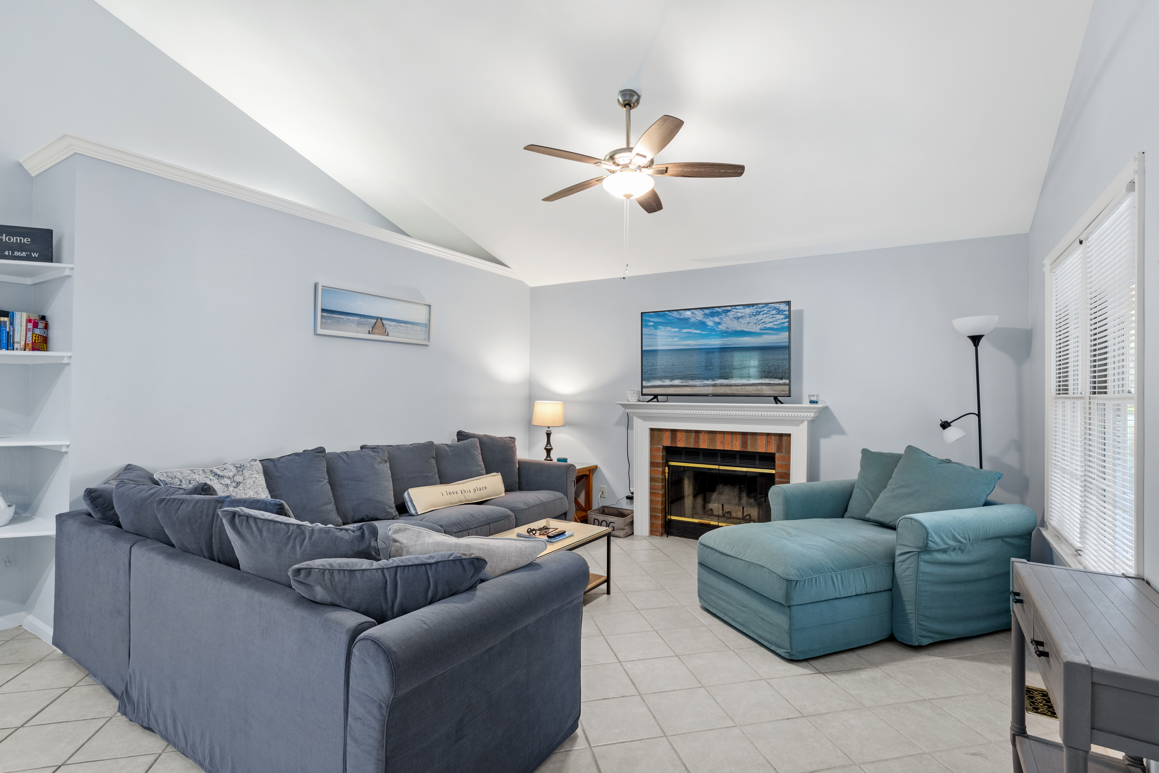 Melt into the plush wrap-around couch & watch a movie on the Flat Screen TV.