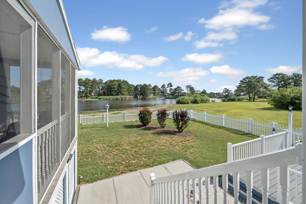 The home has a huge Enclosed Yard directly on the Pond!