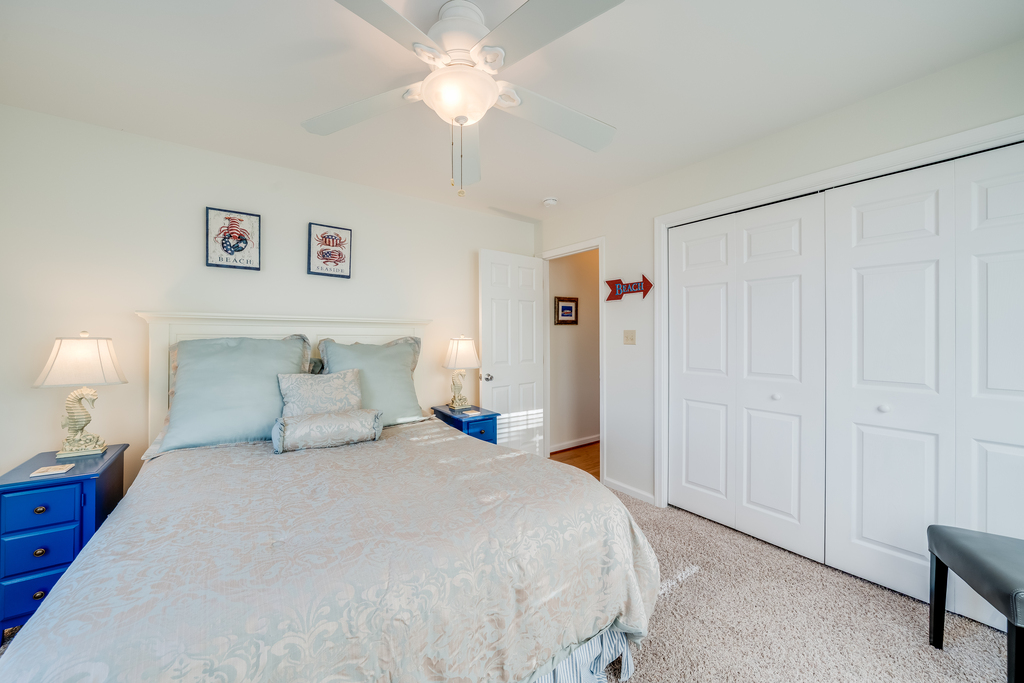 Soothing coastal colors and Flat Screen TV make a restful retreat.