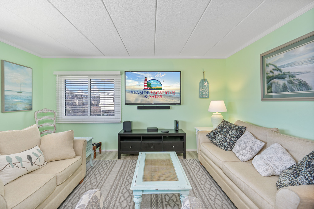 Plenty of seating for the whole family to enjoy their favorite movie on the flat screen tv.