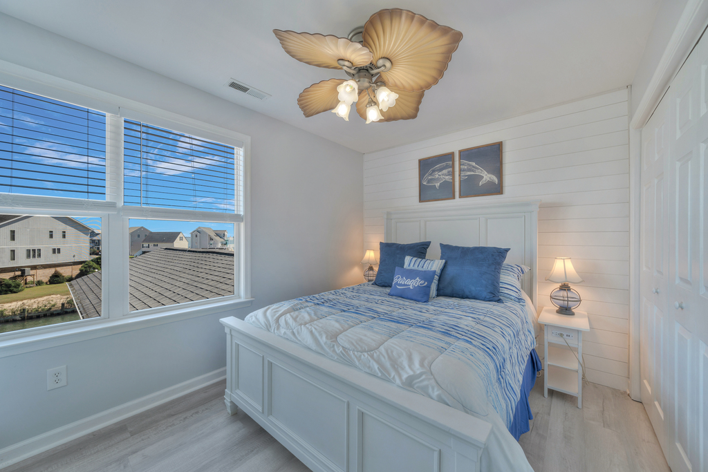 Bedroom 3 has a Queen Bed and lovely Water Views.