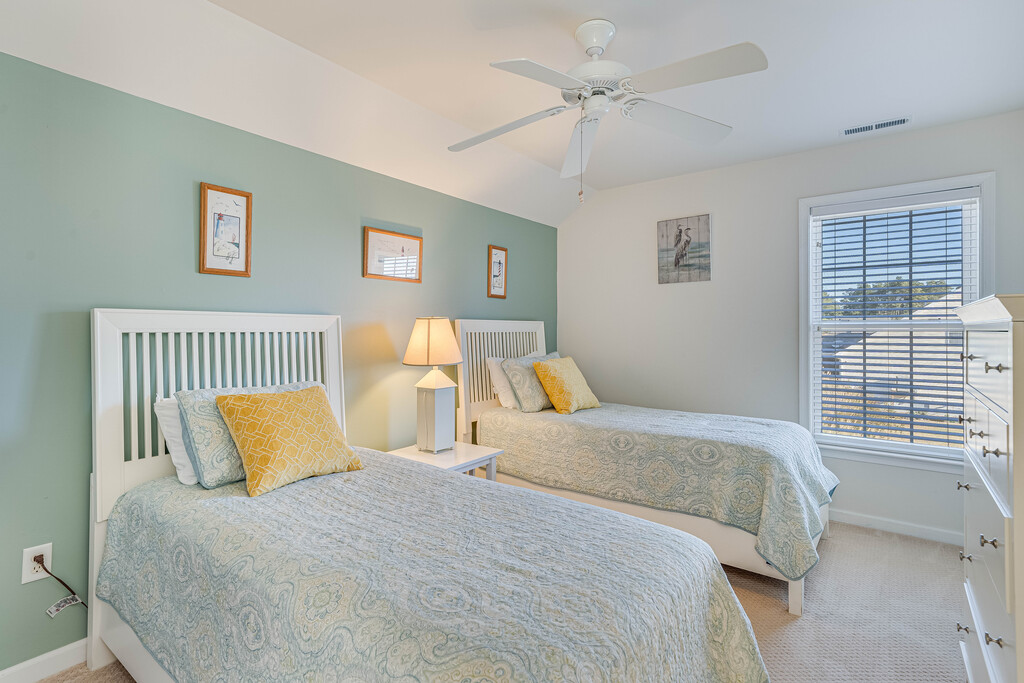 Bedroom 3 is perfect for the kiddos with 2 Twin Beds and calming Coastal Colors.