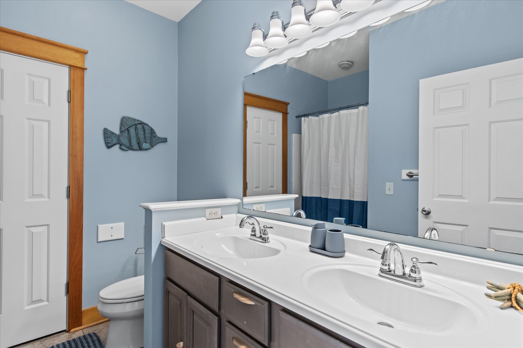 Attached Full Bath with Double Vanity and Walk-in Shower.