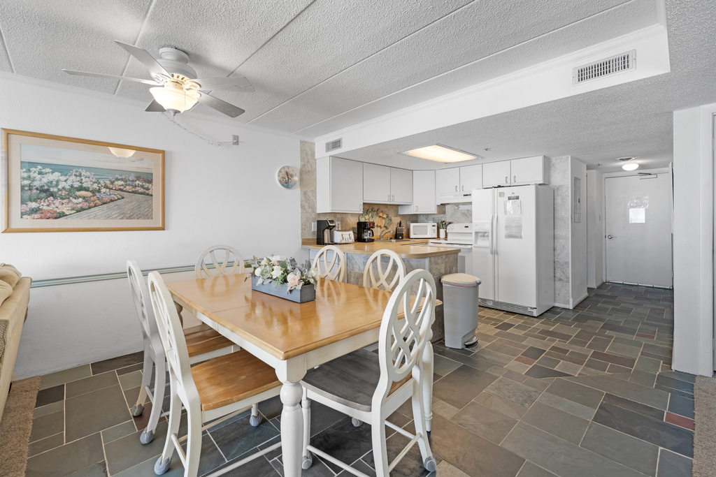 Enjoy dinner with the family at the dining table.