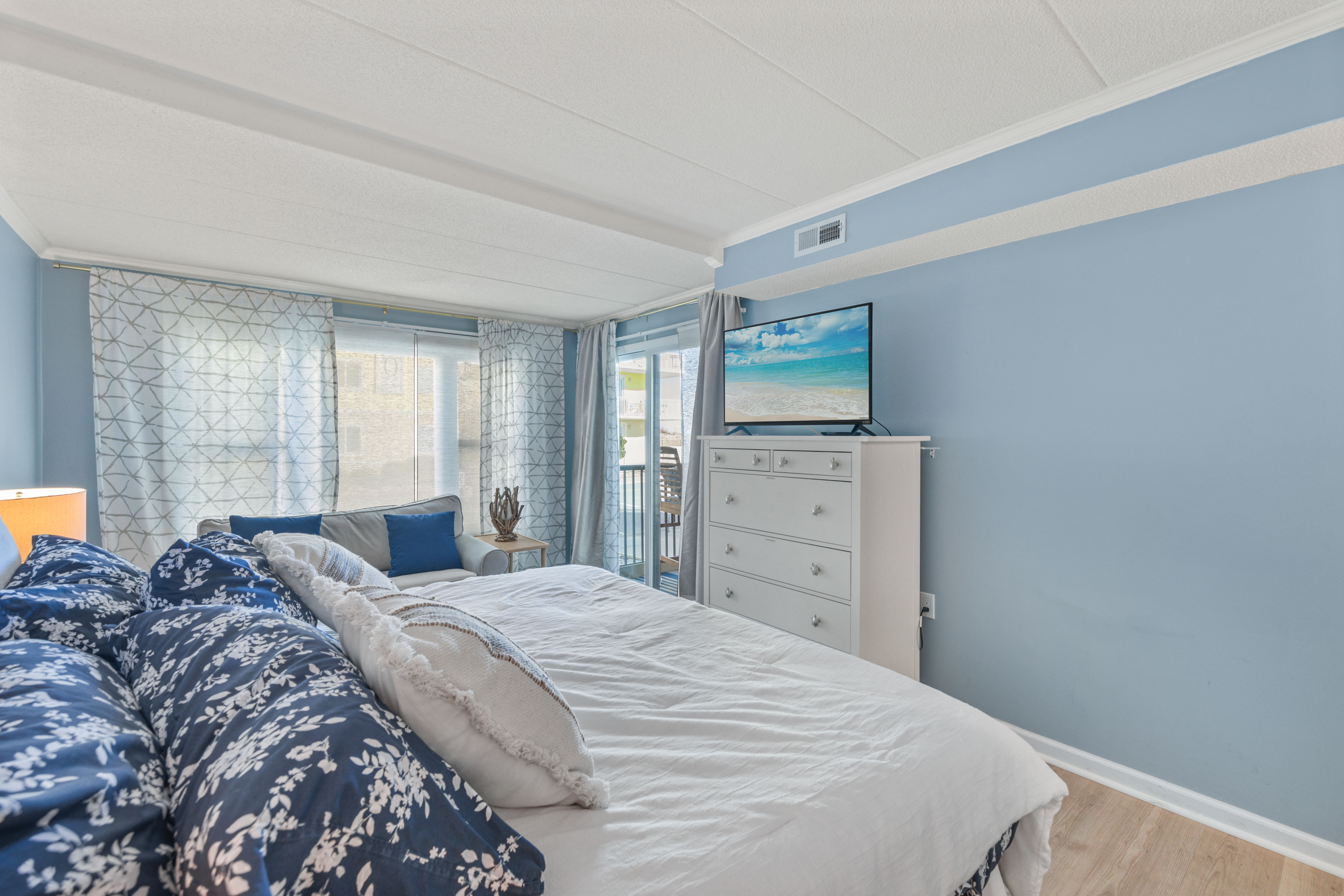 Watch a movie on the Flat Screen TV or slip out of the private Sliding door to the Balcony