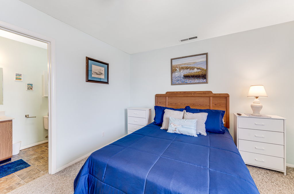 Bedroom 2 has a Queen Bed and Full Sleeper Sofa and sleeps 3.