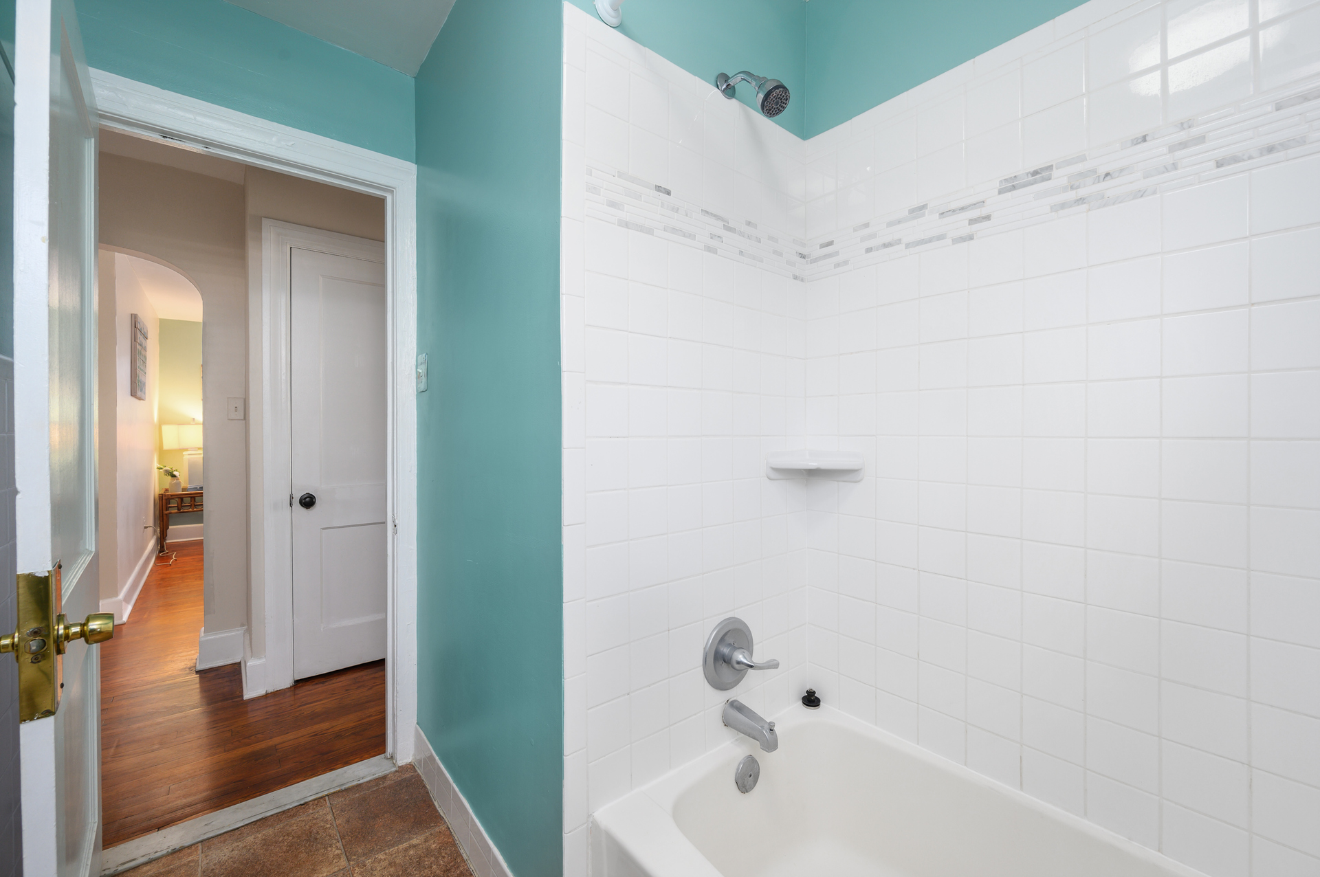 Bathroom 1 offers a lovely tub/shower combo