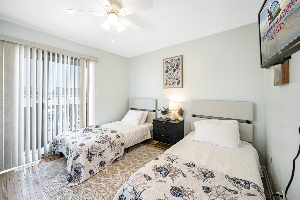 Bedroom 2 has 2 Twin Beds, and loads of natural lighting!