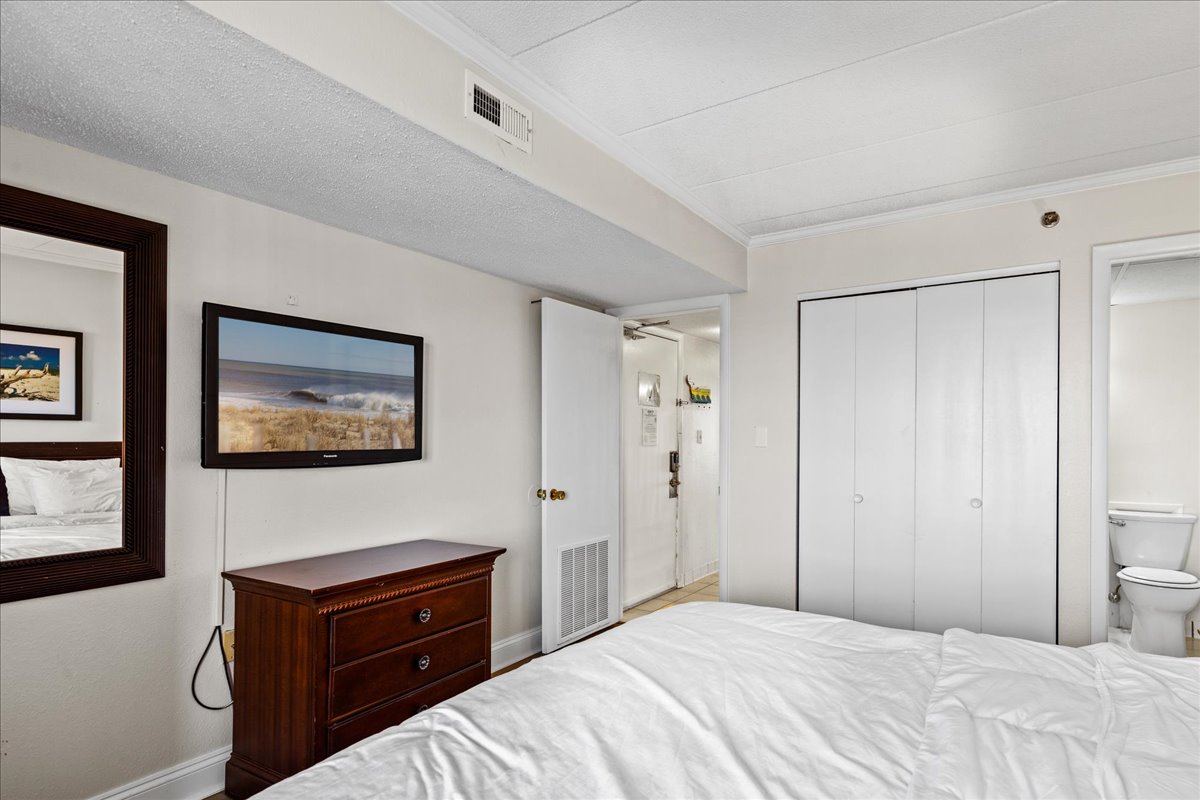 Sink into bed and enjoy the Flat Screen TV!