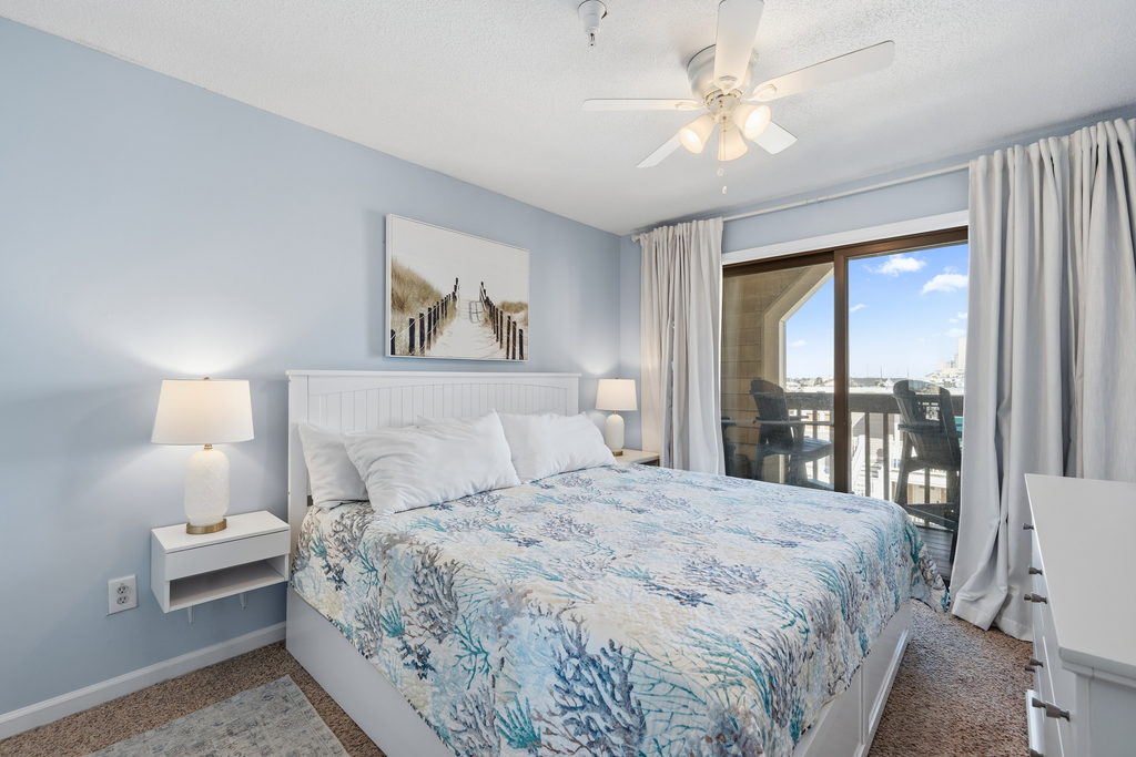 The primary bedroom offers a cozy King Bed!