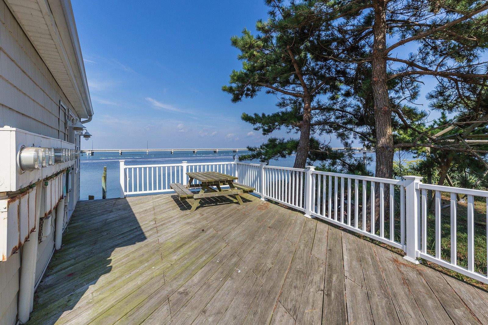 There is a shared Sun Deck with Picnic Area and Charcoal Grill.
