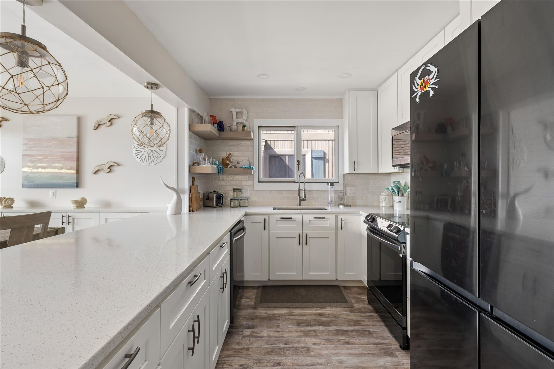 This Stunning and Bright Kitchen is Well-Stocked with everything you'll need!