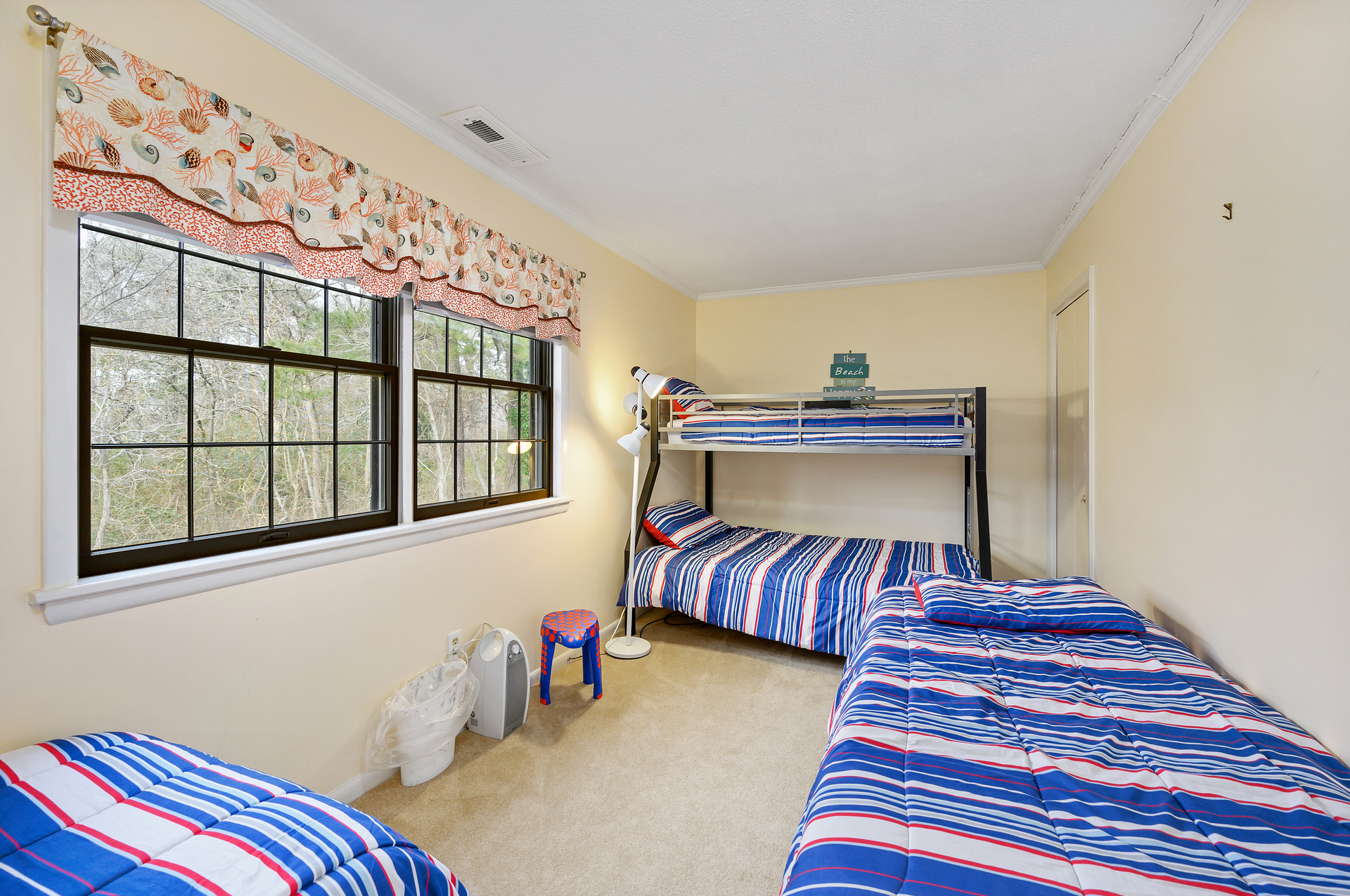 Bedroom 2 sleeps 4 with Twin Bunkbed and 2 Twin Beds.