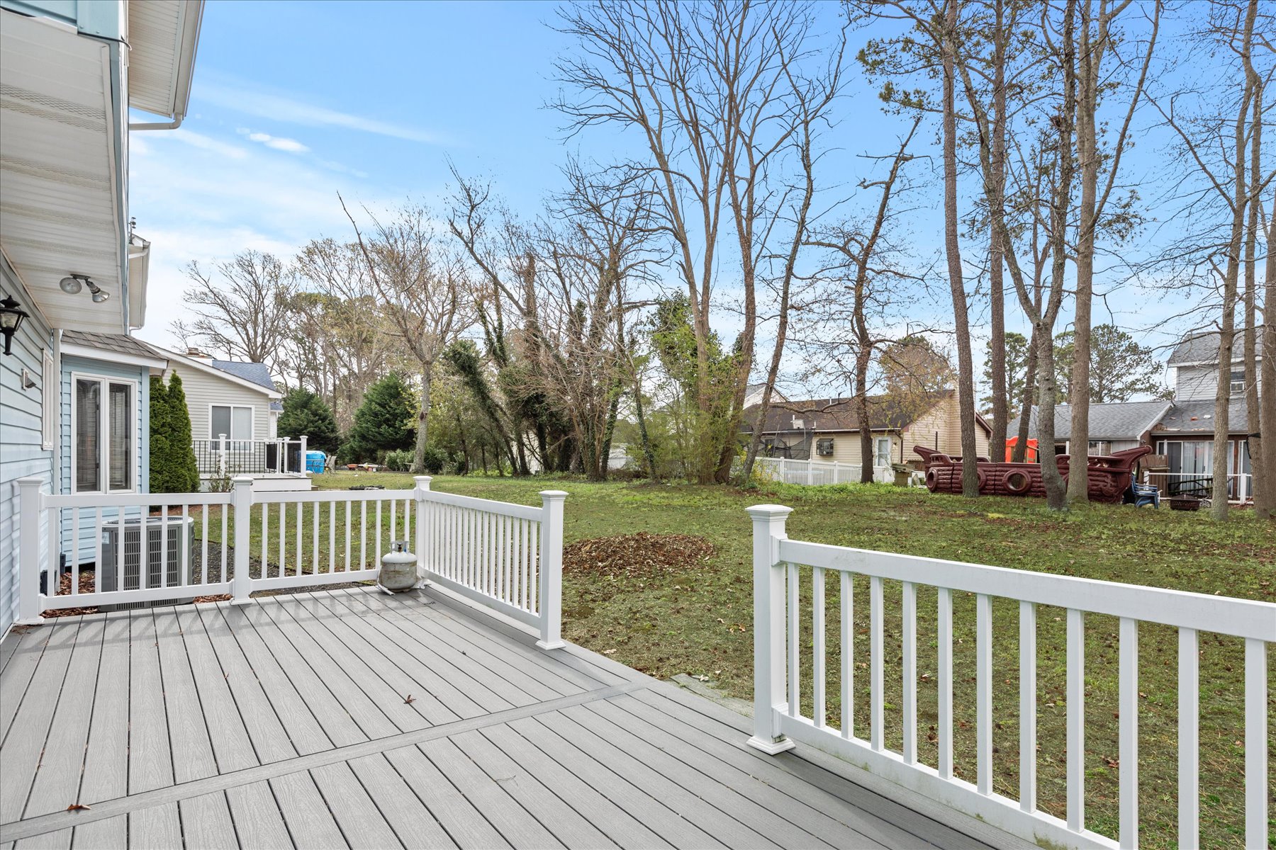 The perfect Backyard for cartwheels and tossing a football with the Kids.
