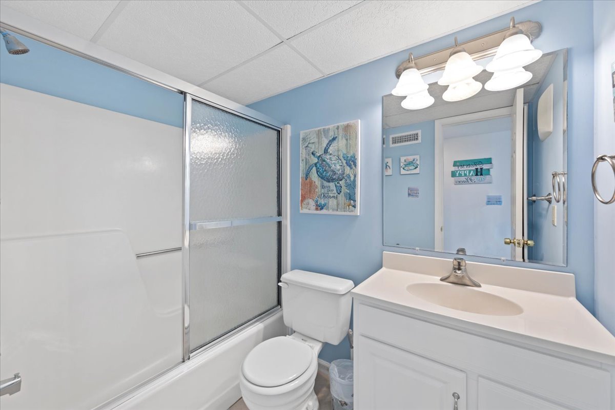 Bathroom 2 is located in the Hall and has a Shower/Tub combo