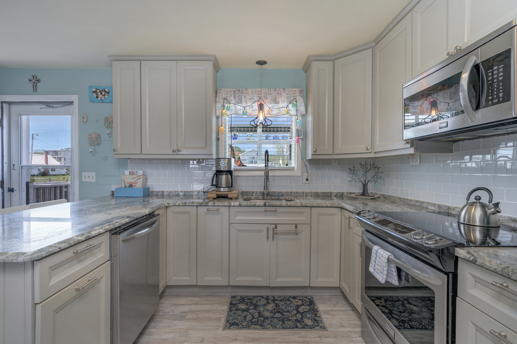 Beachy White Cabinetry and lots of space!